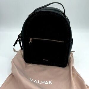 UEC Calpak Kaya faux leather travel backpack in black with gold hardware